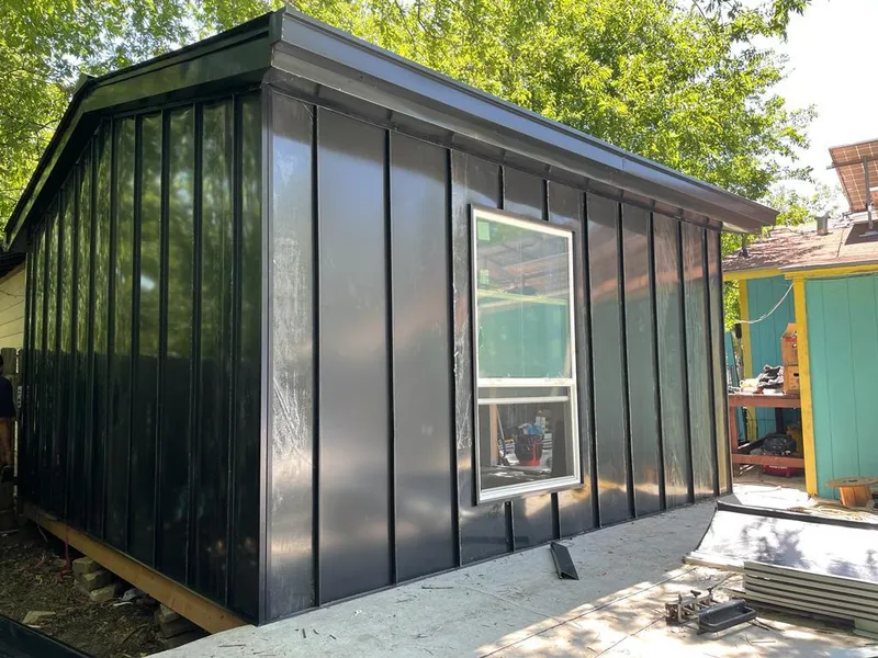 Black standing seam metal wall panels for Roof Inspection in Orchards