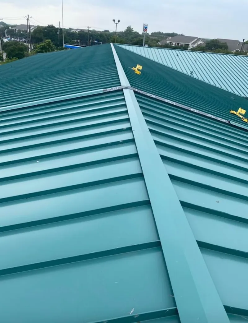 Green commercial metal roof ridge and valley for Metal Roof Repair in Orchards